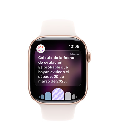 Vista frontal de un Apple Watch Series 10 con correa deportiva blanca, interfaz de usuario con un texto que dice Ovulación, Historial del Ciclo