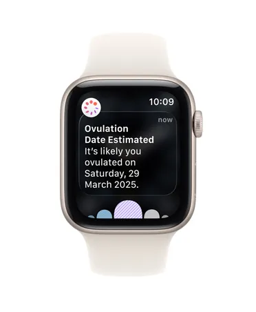 Apple Watch SE 3，採用星光色鋁金屬錶殼，展示透過健康 app 經期追蹤收到的排卵日期回溯推算通知；機身設有數碼錶冠，配搭星光色運動錶帶