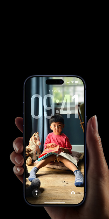 Hand holding iPhone 17 Pro, Message pop-up on personalized Lock Screen