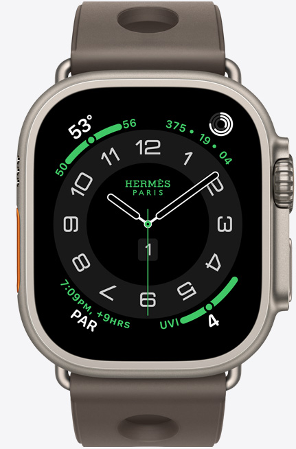 Apple Watch Hermès Ultra 3, boîtier en titane, naturel, cadran Hermès Circulaire, complications: météo, anneaux Activité, heure de Paris, index UV, coté droit, Digital Crown, micro, bouton latéral en saillie, bracelet Scub’H Diving, gris titane